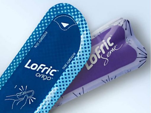Close-up of two LoFric hydrophilic catheter packages.